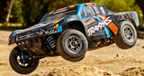 Traxxas 68277-4 Slash 4X4 Ultimate Fully Assembled, Ready-To-Race® with Traxxas Stability Management (TSM)®, 2.4 GHz radio system with Traxxas Link™ Wireless Module, Velineon® Brushless Power System, and Clipless ProGraphix® Painted Body