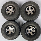TBID STG2 Stage 2 Standard Compound Mudboss Tires (Black and Silver Wheels)